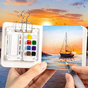 Paleta de aquarela portátil
Paleta acrílica compacta
Estojo para tinta de aquarela
Ferramentas de pintura ao ar livre
Paleta magnética para aquarela
Conjunto de pintura portátil Mini Paleta de Aquarela Acrílica Portátil, com design compacto e fecho magnético. Disponível em versões com 8 ou 15 compartimentos, perfeita para pinturas ao ar livre. Feita de acrílico durável, fácil de transportar e limpar. Ideal para artistas, estudantes de arte e entusiastas da pintura.